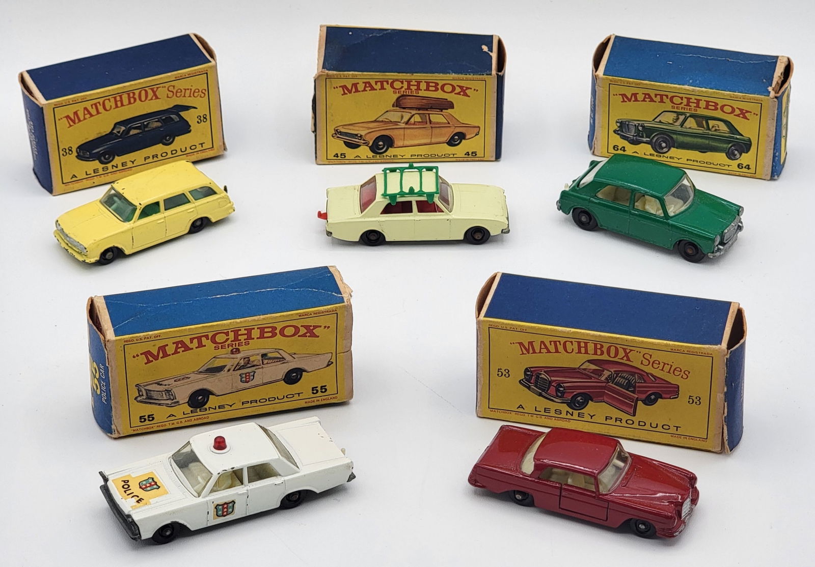 (5) Vintage Lesney Matchbox Vehicles In Original Boxes: (5) Vintage Lesney Matchbox Vehicles In Original Boxes. Lot includes #45 Ford Corsair (missing boat), #53 Mercedes Benz Coupe, #38 Vauxhall Victor Estate Car, #64 M.G. 1100, & #55 Ford Galaxie Police