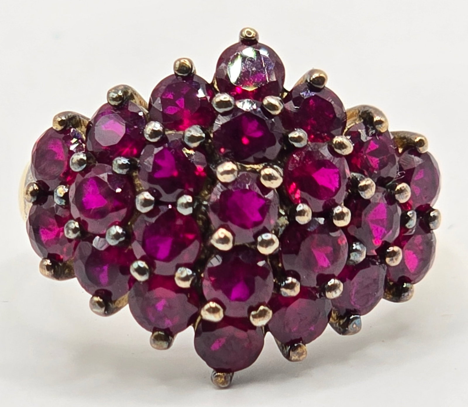 Ladies Gold Overlay Sterling Silver Red Garnet Cluster Ring: Ladies Gold Overlay Sterling Silver Red Garnet Cluster Ring. Ring is size 9 and the total weight is 5.86 grams.