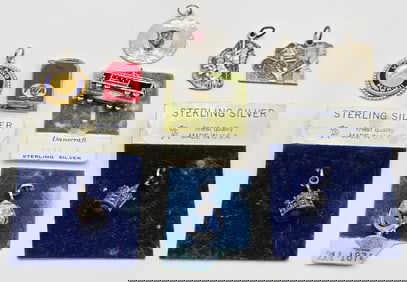 Lot Of Nine Sterling Silver Charms