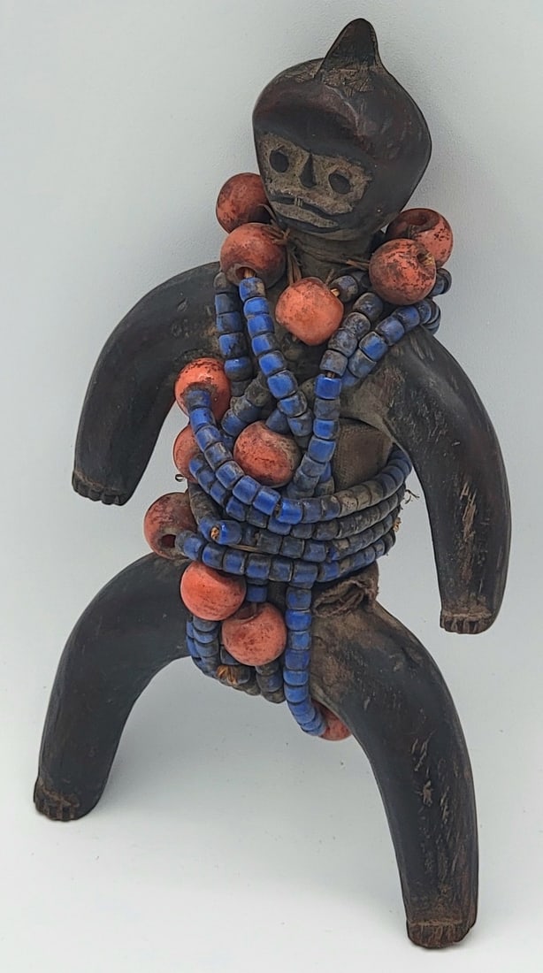 Vintage African Cameroon Tribal Hand Carved Wooden Namji Fertility Doll: Vintage African Cameroon Tribal Hand Carved Wooden Namji Fertility Doll. The doll in traditionally given to young girls to promote fertility. Nice condition, displays well. Measures approximately 8-1/