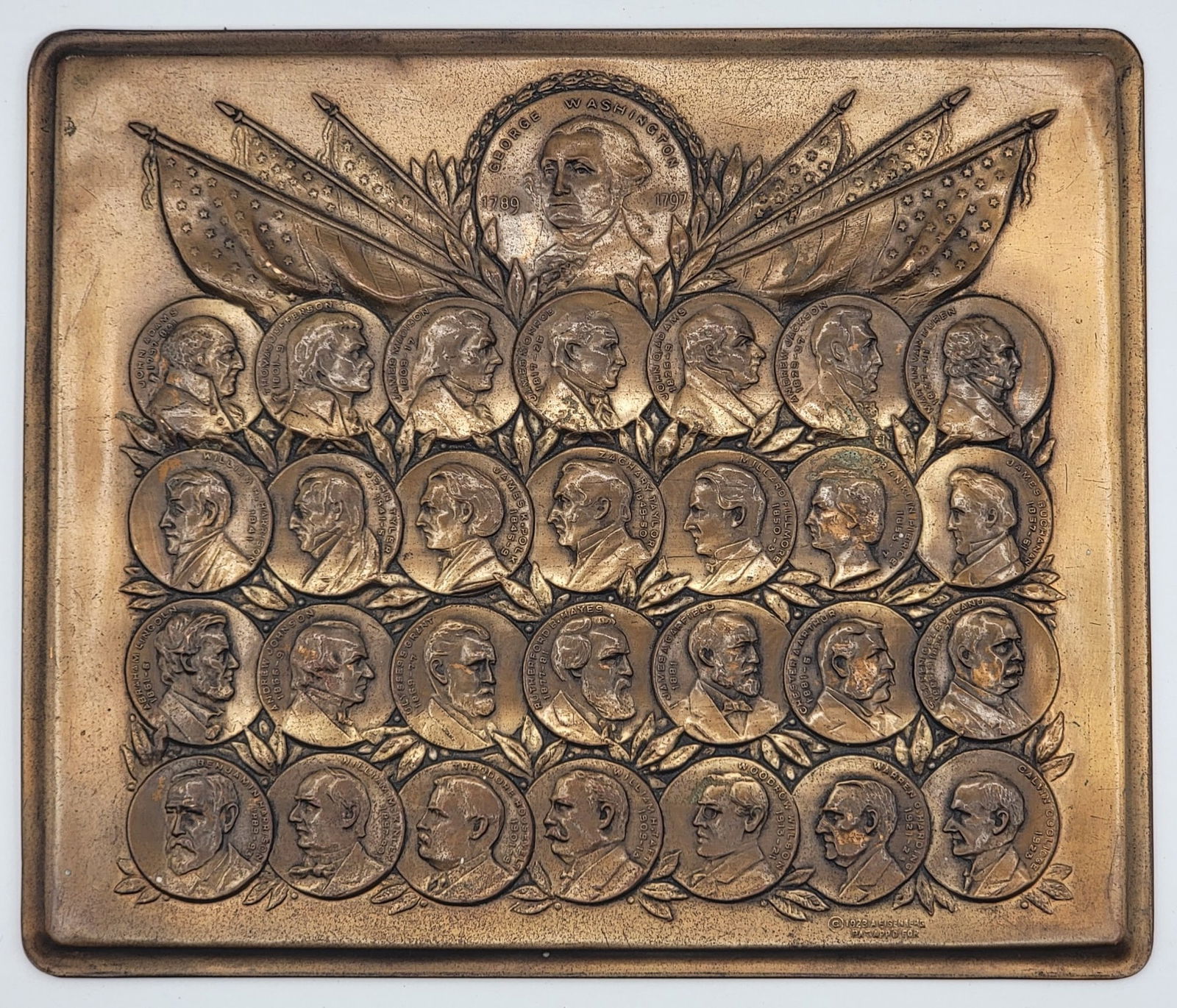 1922 Copper Plaque Of The First 29 U.S. Presidents By Abraham Eisenberg: 1922 Copper Plaque Of The First 29 U.S. Presidents By Abraham Eisenberg. Features George Washington through Calvin Coolidge. The reverse has a door that opens with biographies of all the Presidents. M