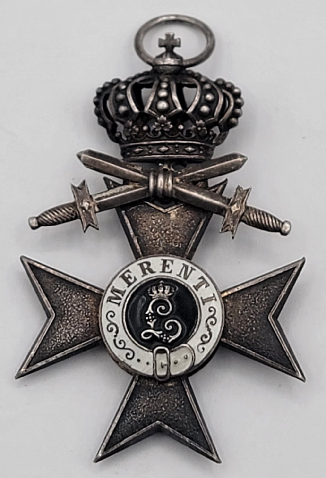 WW1 Imperial German Bavarian Military Merit Cross 2nd Class: WW1 Imperial German Bavarian Military Merit Cross 2nd Class. The cross with crown and cross swords is silvered and has a center enameled medallion. Measures 2-3/4" tall x 1-3/4" wide.