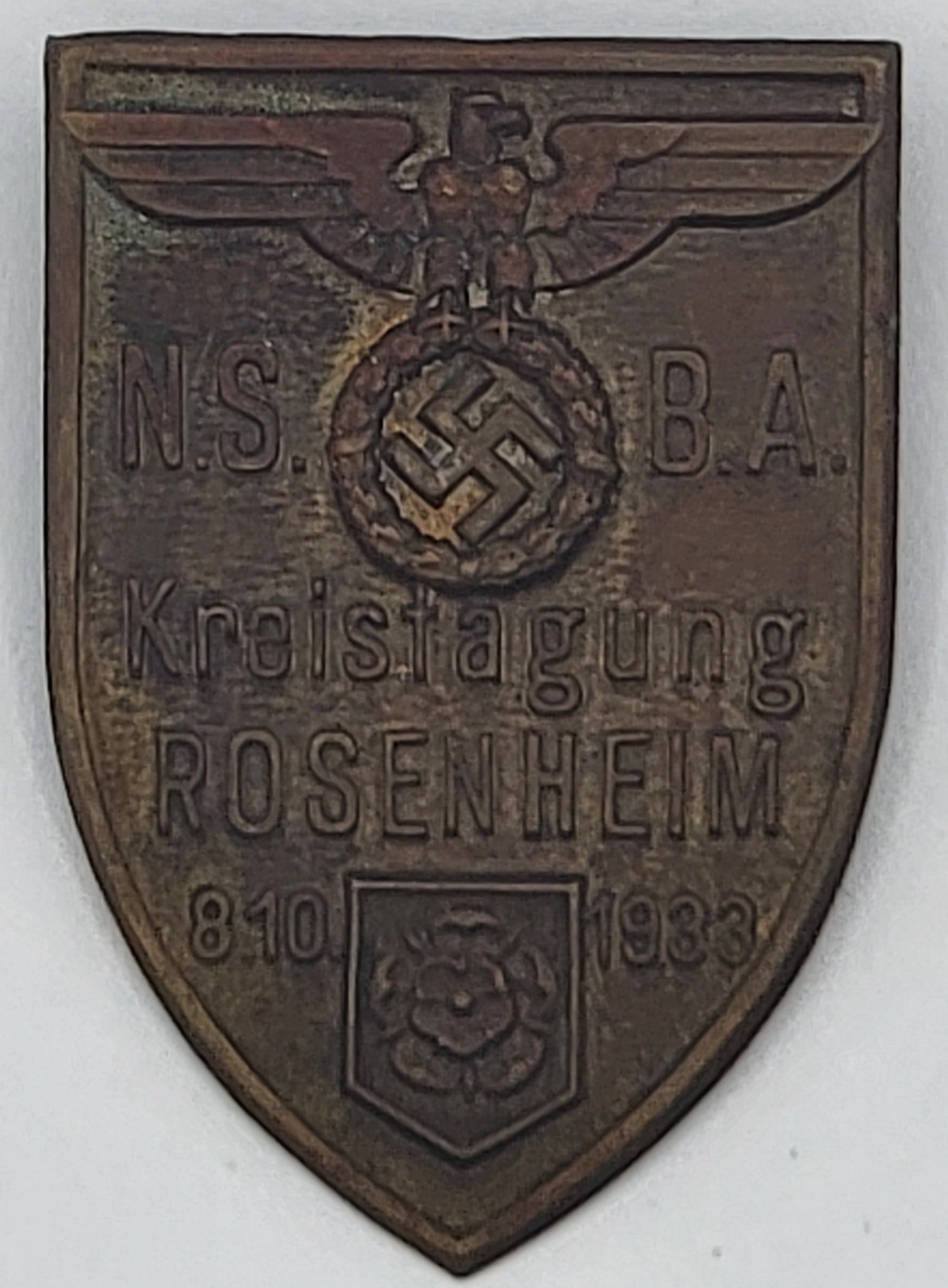 1933 Rosenheim Nazi Party NSBA Kreistagung Day Badge: 1933 Rosenheim Nazi Party NSBA Kreistagung Day Badge. The tomback badge is in very nice condition and measures 1-3/4" tall x 1-1/4" wide.
