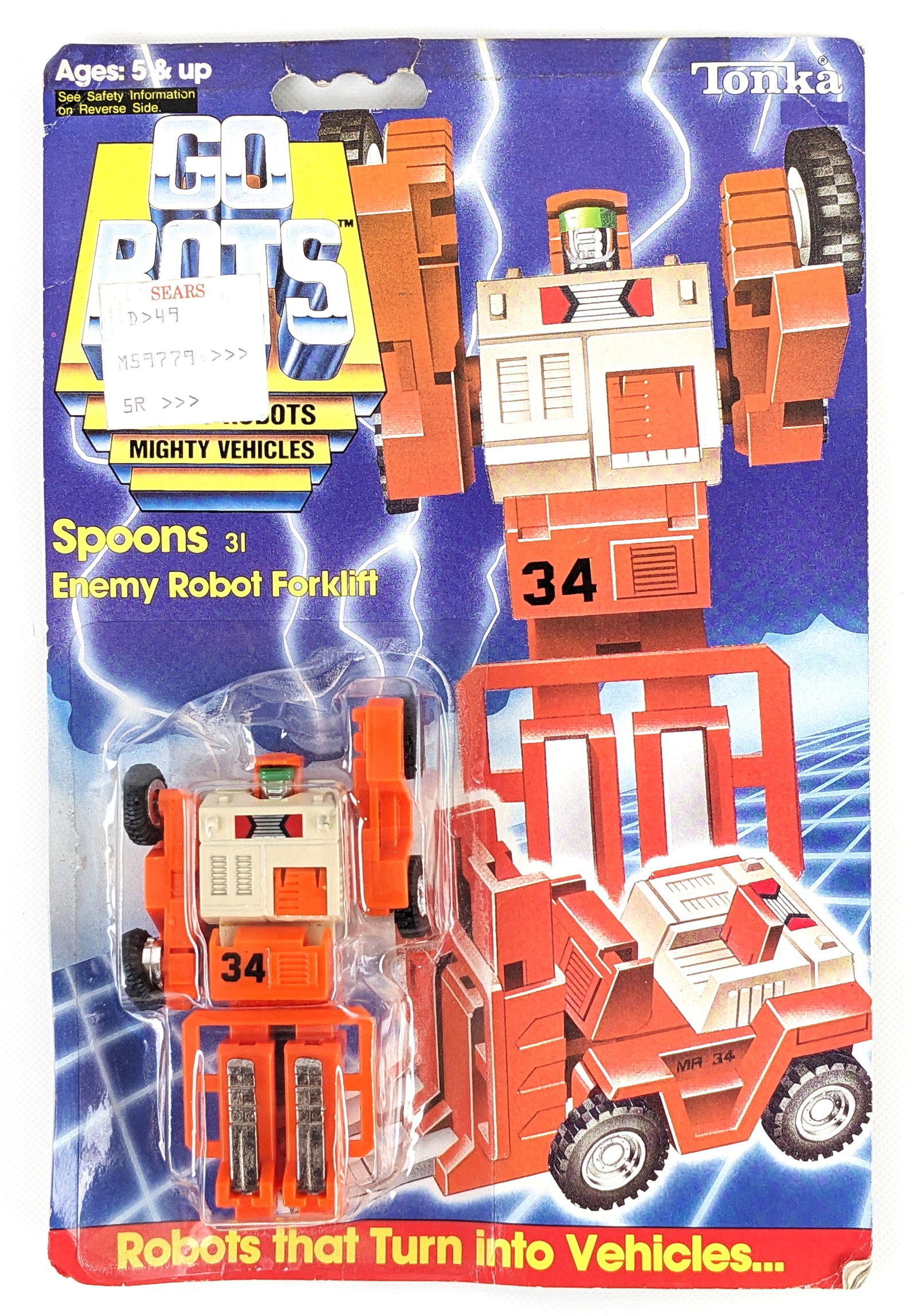 Vintage Tonka Go Bots Mighty Robot Vehicles - Spoons #31 NIP: Vintage 1984 Tonka Go Bots Mighty Robots Vehicles - Spoons #31 figure new in the original package. The package has some warping, soft corners, and creasing from age. Displays very well overall.