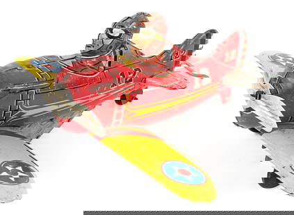 Marx Tin Litho Windup Rollover Plane: Marx tin litho windup rollover plane. The windup mechanism works, but is weak. The toy has some scratches and wear from play / age. It is missing one of the tailfins. Wingspan measures approximately 6