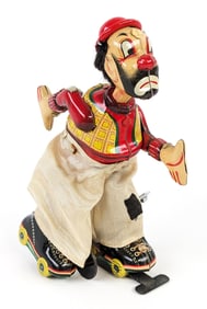 TPS Japan Tin Windup Clown on Roller Skates