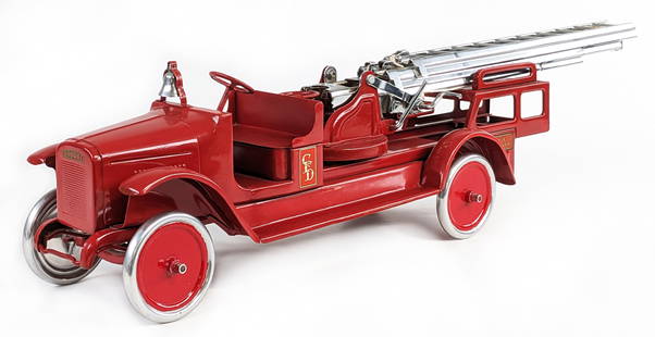 Restored Buddy L Aerial Ladder Fire Truck: Professionally restored Buddy L aerial ladder fire truck. The truck has a very nice restoration with nickeled ladders. The crank for the ladders work and the hydraulic lift works. Displays very well o