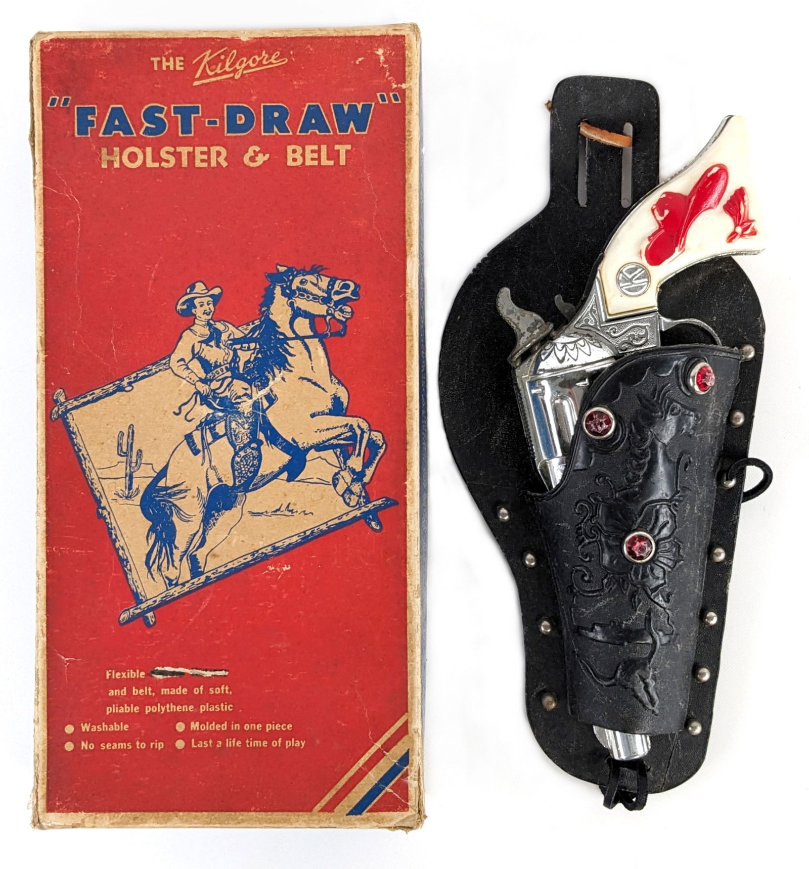 Kilgore Fast-Draw Holster w/ Ranger Cap Gun In Box: Kilgore fast-draw holster with Kilgore Ranger cap gun in box. The holster is missing the belt. The cap gun has yellowing to the grips and light use wear. It appears to function as it should. The box l