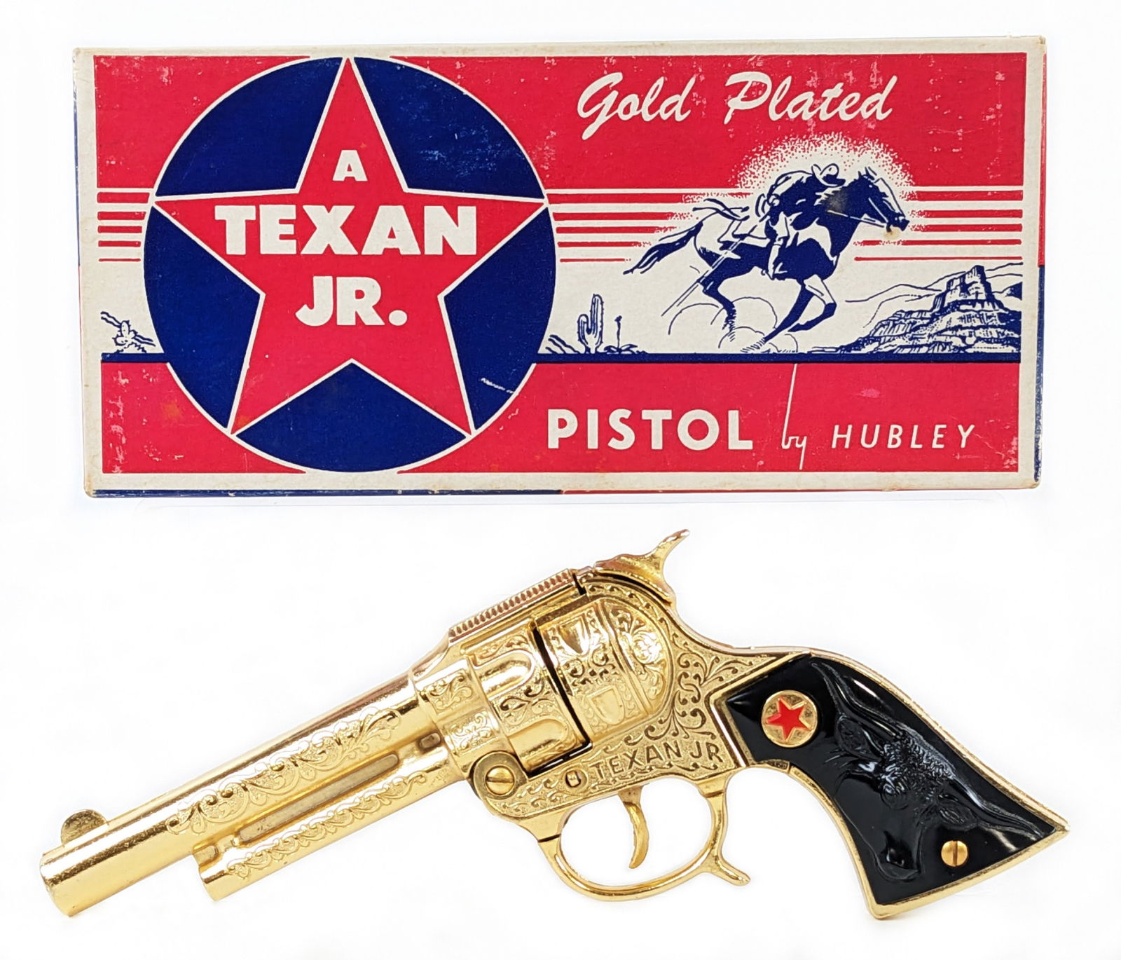 Hubley Texan Jr. Gold Plated Cap Pistol Gun w/ Box: Hubley Texan Jr. gold plated pistol cap gun in the original box. The gun is in excellent working condition. The box has minor loss. Overall displays very well and would be tough to upgrade. Measures a