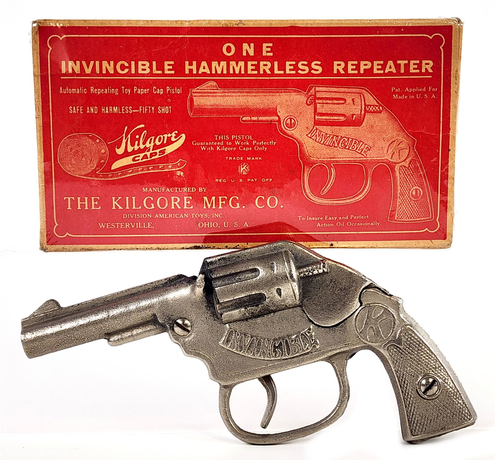 Kilgore Invincible Hammerless Repeater Cap Gun w/ Box: Kilgore Invincible hammerless repeater cap gun with original box. The cap gun is in excellent working condition. The box was wrapped in plastic to help preserve it. Displays very well and is an unusua
