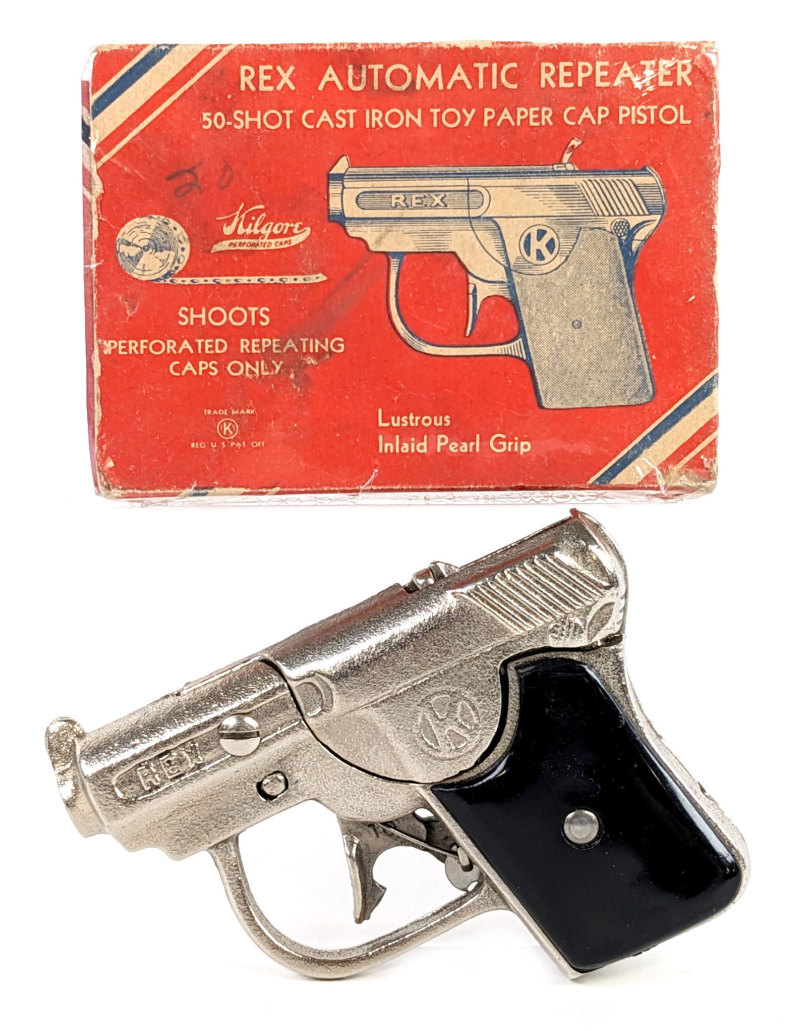 Kilgore Rex Automatic Repeater Cap Gun Pistol w/ Box: Kilgore Rex automatic repeater cap gun pistol. The gun is in excellent working condition. The box was wrapped in plastic wrap to help preserve it. It does show some soiling and writing on the box. The