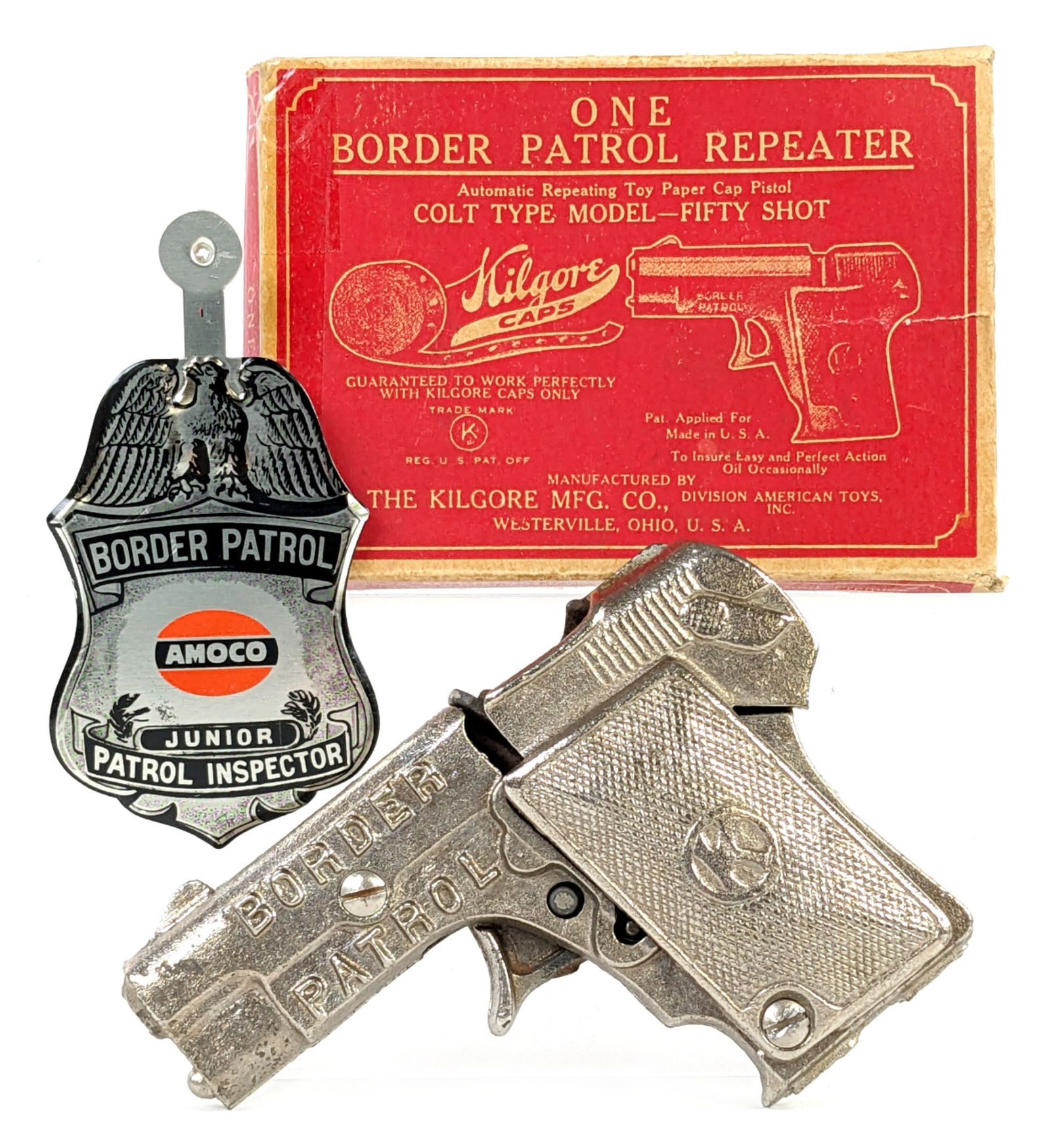 Kilgore Border Patrol Repeater Cap Gun Pistol w/ Box: Kilgore Border Patrol repeater cap gun pistol with the original box and an Amoco Border Patrol tin badge. The gun is in working order with light wear from use / age. The box has one main flap taped an
