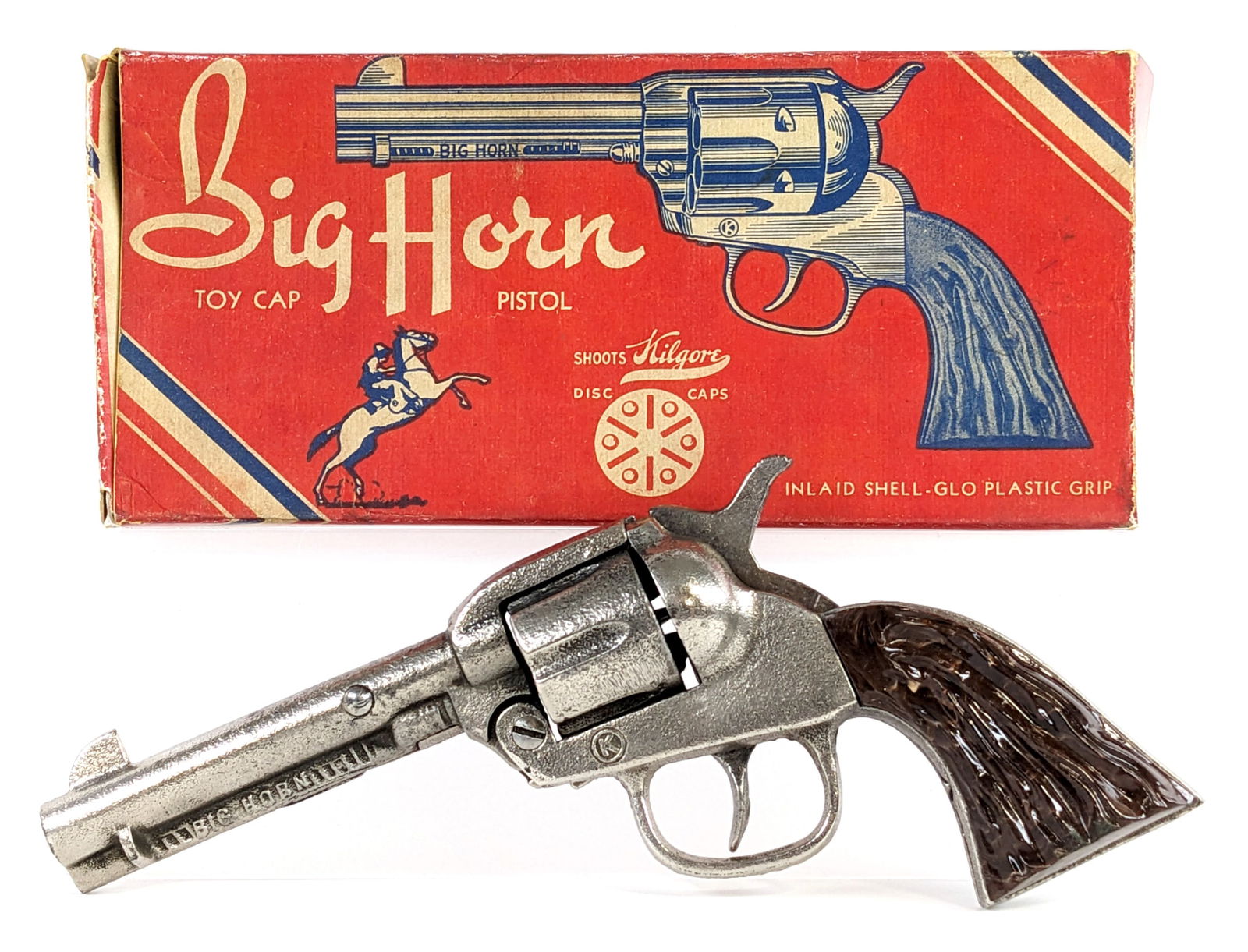 Kilgore Big Horn Revolver Cap Gun Pistol w/ Box: Kilgore Big Horn cap gun pistol with reproduction box. The box is a nice quality reproduction. The gun is in working condition. It shows minor wear from age. Measures 8" long.