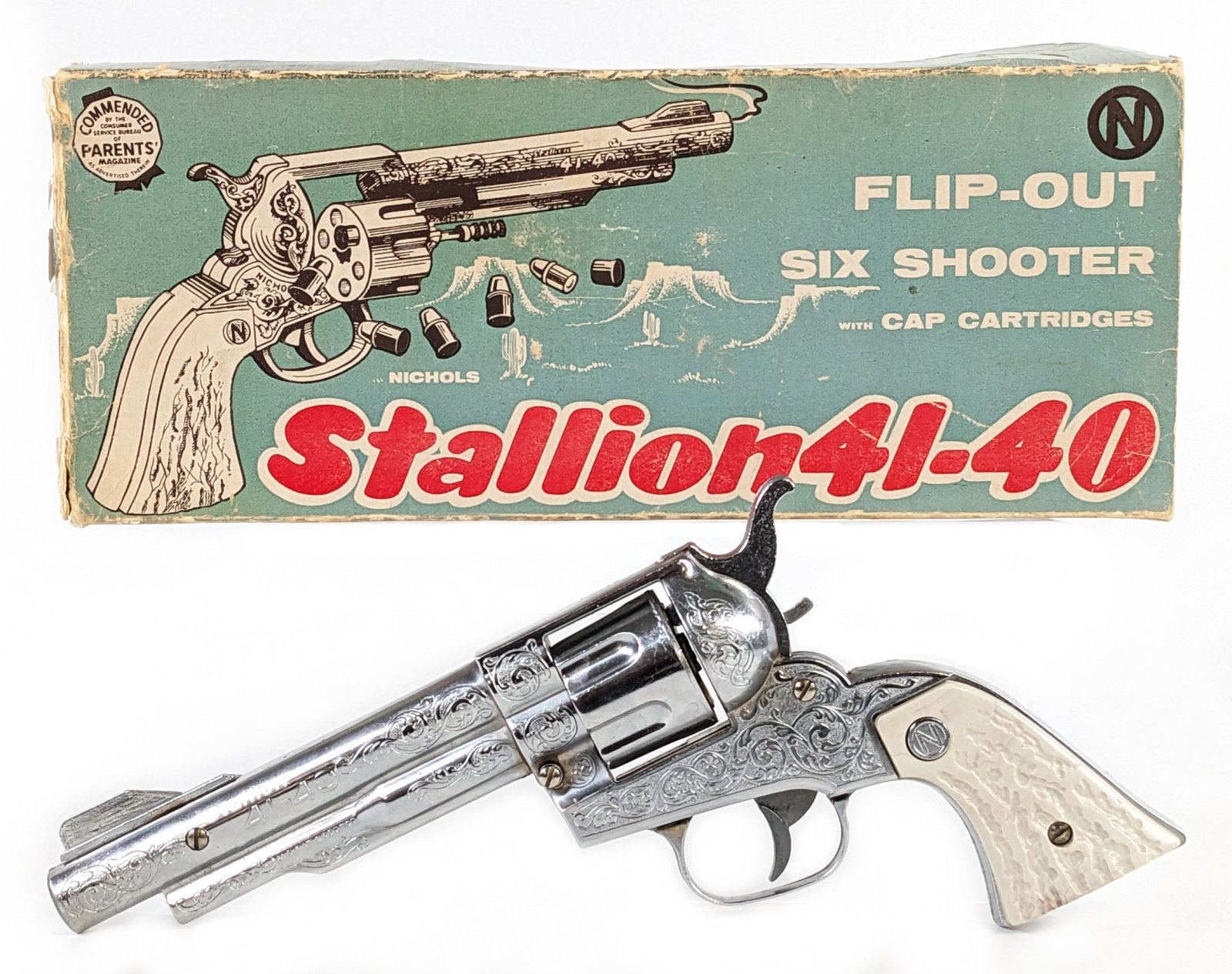 Nichols Stallion 41-40 Flip-Out Six Shooter Cap Gun Pistol w/ Box: Nichols Stallion 41-40 flip-out six shooter cap gun pistol with original box. The gun comes with the six cap cartridges. The cylinder "flips out" when the trigger is pulled. The trigger functions, but