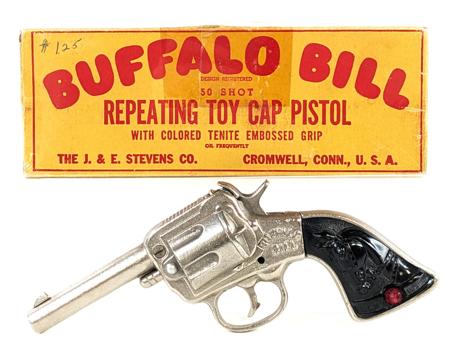 J&E Stevens Co. Buffalo Bill Cap Gun Pistol w/ Box: J. & E. Stevens Buffalo Bill 50 shot repeating toy cap pistol with original box. The box was wrapped in plastic to help preserve it. It shows some tape and wear from age. The gun is in excellent condi