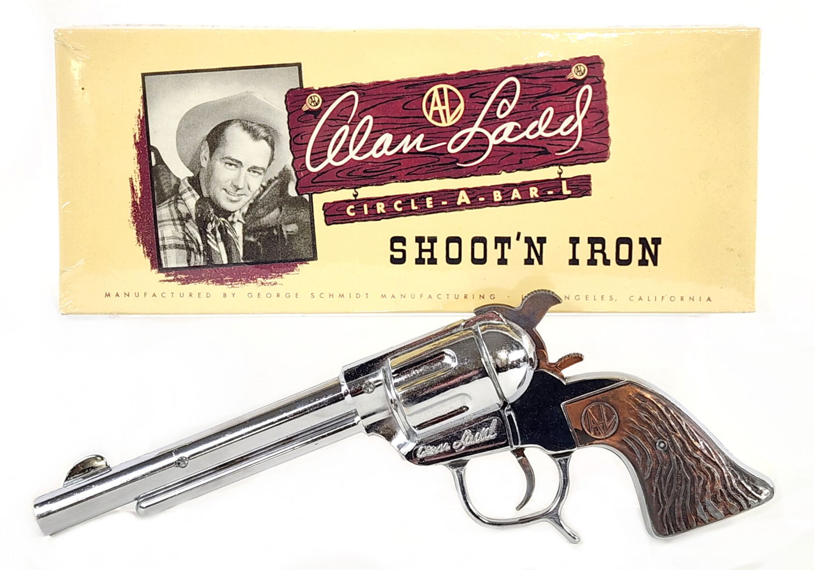 George Schmidt Alan Ladd Circle-A-Bar-L Shoot'n Iron Cap Gun Pistol: George Schmidt Alan Ladd Circle-A-Bar-L Shoot'N Iron cap gun pistol with high quality reproduction box. The cap gun is in excellent condition with minor age wear. The box is a nice quality reproductio