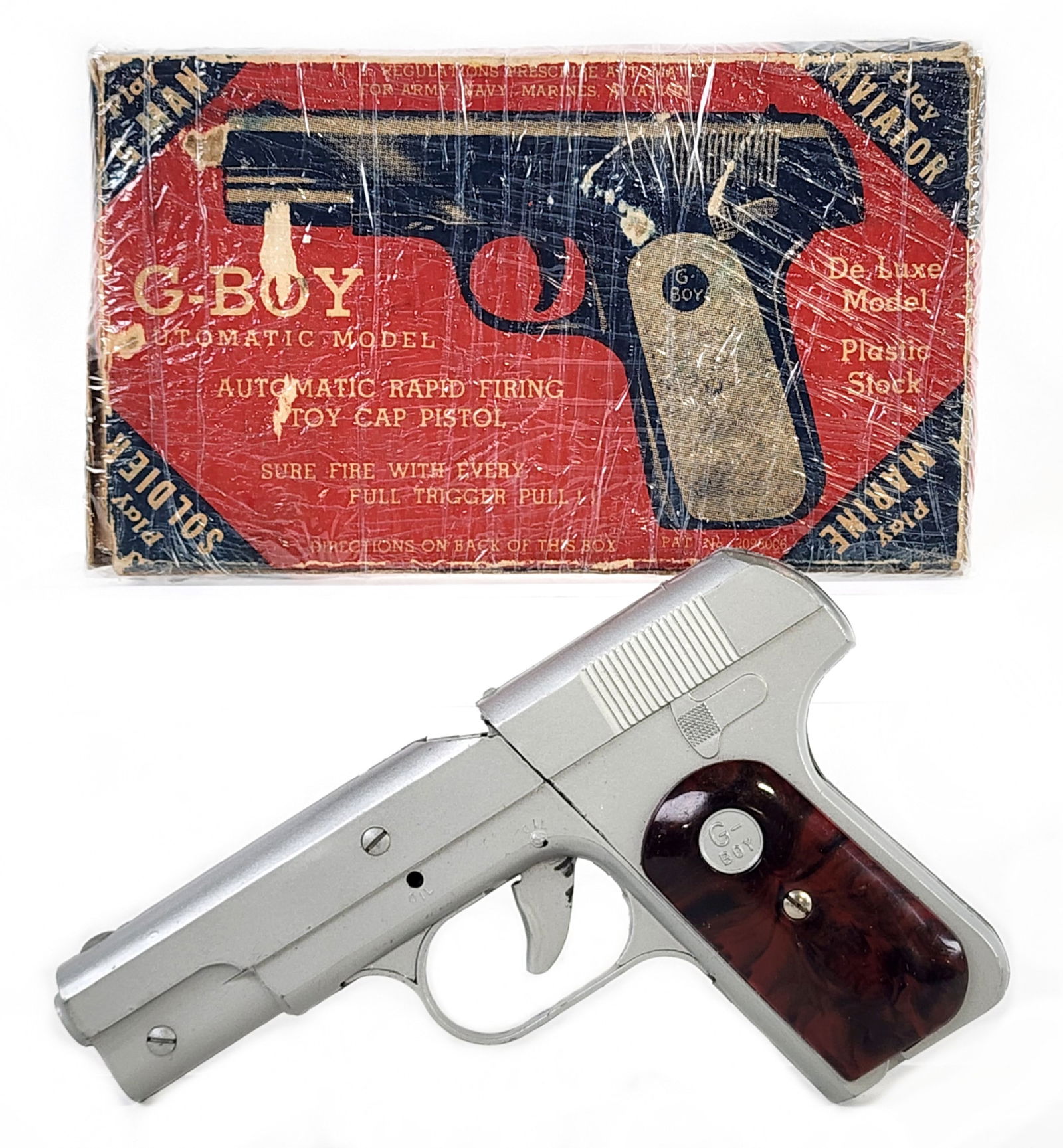 Acme G-Boy Cap Gun Pistol w/ Box: Acme G-Boy cap gun pistol with the original box. The gun is in excellent condition and appears to function as it should. It does have some minor loss where the trigger rubs on the gun. The box was wra