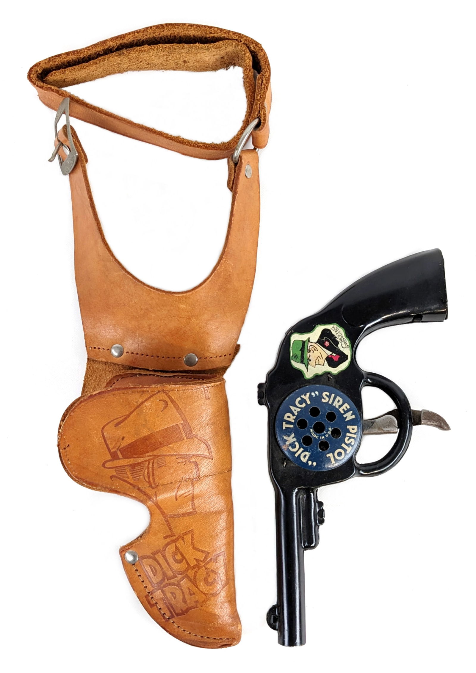 Marx Dick Tracy Siren Pistol w/ Dick Tracy Holster: Marx Dick Tracy siren pistol with Dick Tracy leather holster. The siren on the pistol works. The holster wasn't made for the gun. Measures 8-1/2" long.