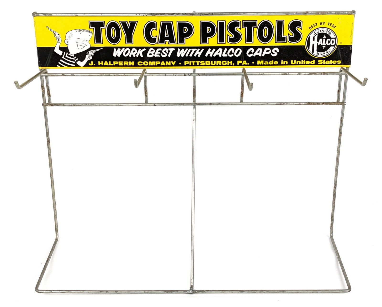 Halco Toy Cap Pistols Store Display Advertising Rack: Original hard to find Halco Toy Cap Pistols store display advertising rack. The rack has a single sided tin Halco Toy Cap Pistols advertising sign and 4 pegs that the gun packages would have hung on.