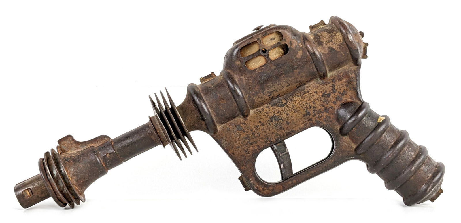 Daisy Buck Rogers Disintegrator Atomic Pistol: Daisy Buck Rogers Disintegrator atomic pistol sparkling pop gun. The gun a makes a popping noise when the trigger is pulled, but no longer sparks. It shows paint loss, surface rust, and wear from play