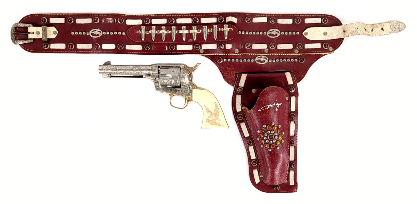 Franklin Mint John Wayne Commerative Colt 45 Revolver: Very nice high quality replica by Franklin Mint of the 1871 Colt .45 revolver that was made by Colt for John Wayne. The revolver shows the same serial number as the original (151284). John Wayne's sig
