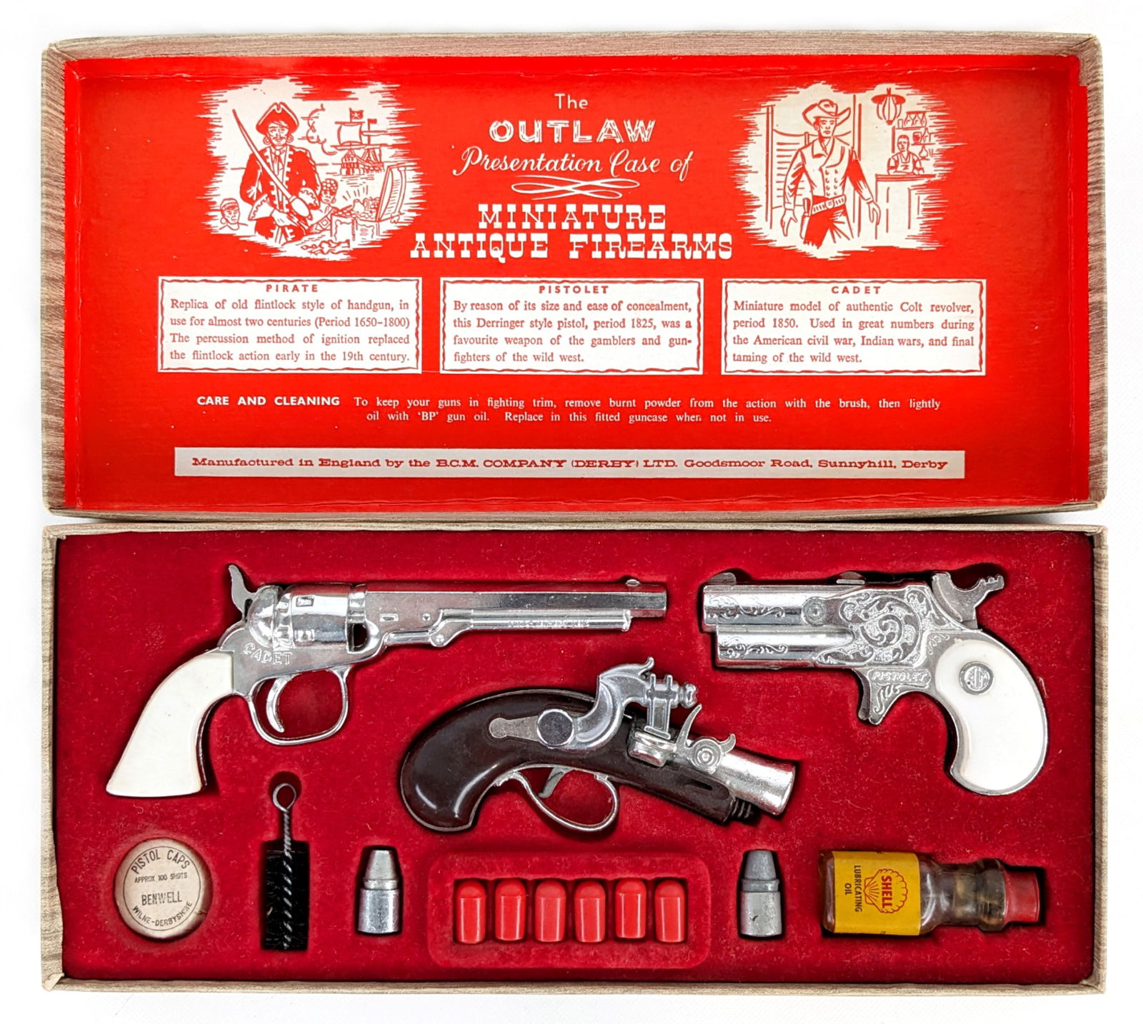 BCM Co. Colt Revolver, Flintlock, & Derringer Miniature Firearm Replica's: The Outlaw Presentation Case of Miniature Antique Firearms by B.C.M. Company in the original display box. The set includes a flintlock style handgun, Derringer style pistol, and Colt revolver style gu