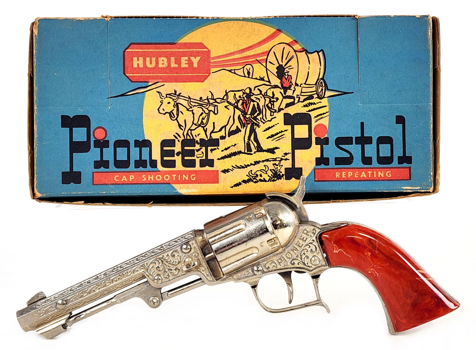 Hubley Pioneer Pistol Cap Gun w/ Box: Hubley Pioneer pistol cap gun with the original box. The gun and box are in very good condition. The gun works as it should. It may show some minor use wear, but overall is very clean. The box has som