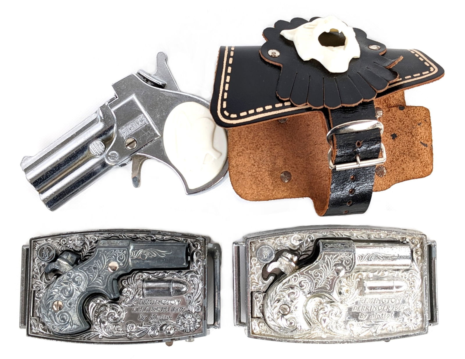 Hubley Panther & (2) Mattel Derringer Cap Gun Pistols: Hubley Panther derringer cap gun pistol with spring action wrist cuff and (2) Mattel derringer belt buckle cap gun pistols. The Hubley Panther is in excellent condition. The belt buckle guns show some