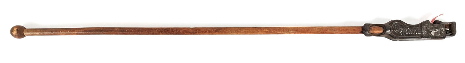 Early National Cast Iron & Wood Cane Cap Gun: Circa early 1900's National cap firing cane. The cane appears to be in working condition, but sometimes the caps don't roll out by themselves. A very unique cap gun that you hardly ever see. Measures