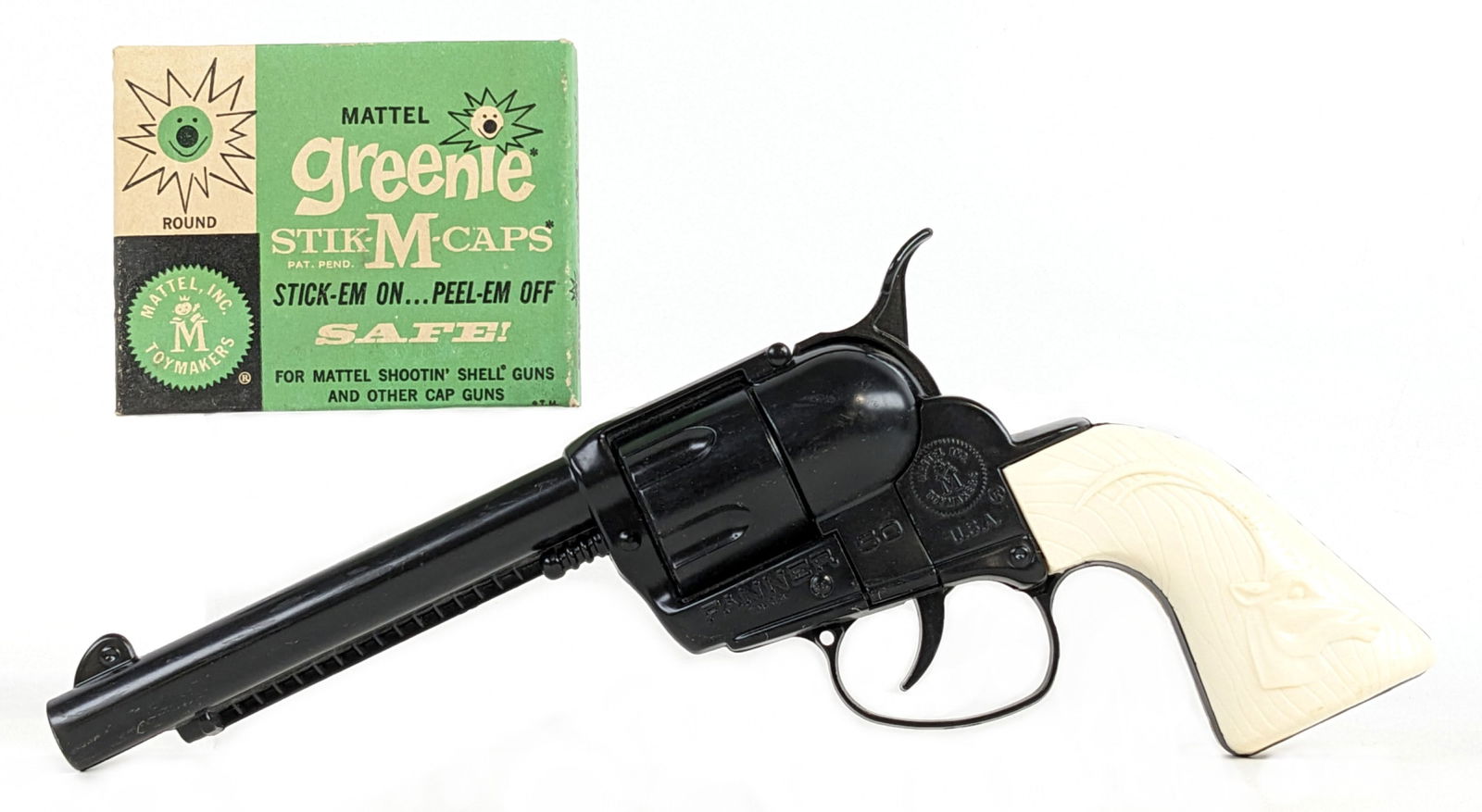 Mattel Fanner 50 Cowboy In Africa Cap Gun w/ Greenie Stik-M-Caps: Mattel Fanner 50 cowboy in Africa cap gun with a package of Mattel greenie stik-m-caps. The gun is in excellent condition and appears to work as it should. It has some light wear form handling / age.
