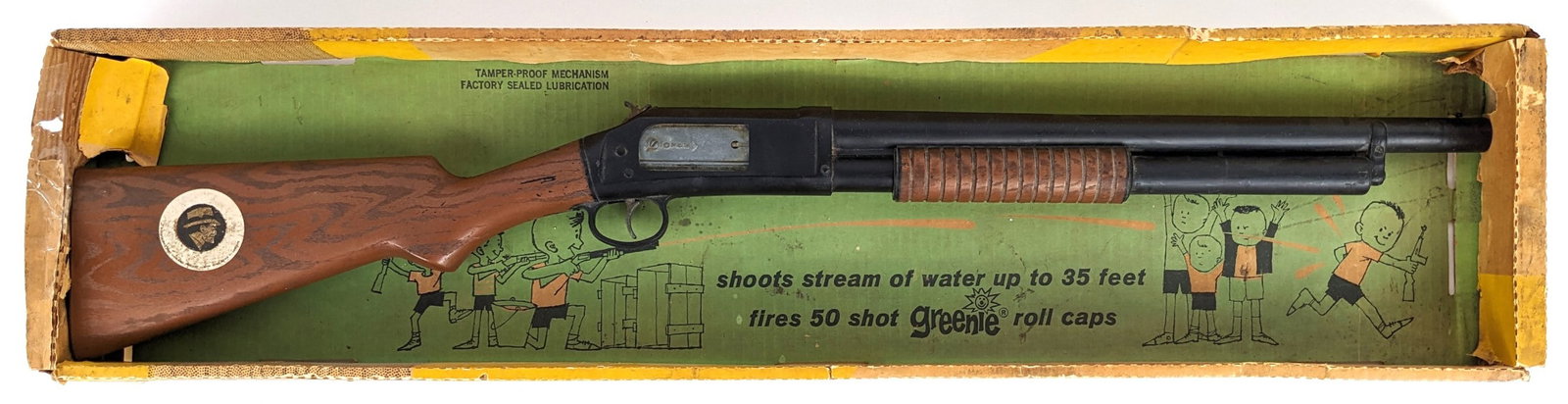 Mattel Dick Tracy Power-Jet Squad Gun In Box: Mattel Dick Tracy power-jet squad gun in the original box. The gun is a squirt gun and cap firing gun. A really unique toy. The box has staining, tape on the one end, and wear from age / storage. The 