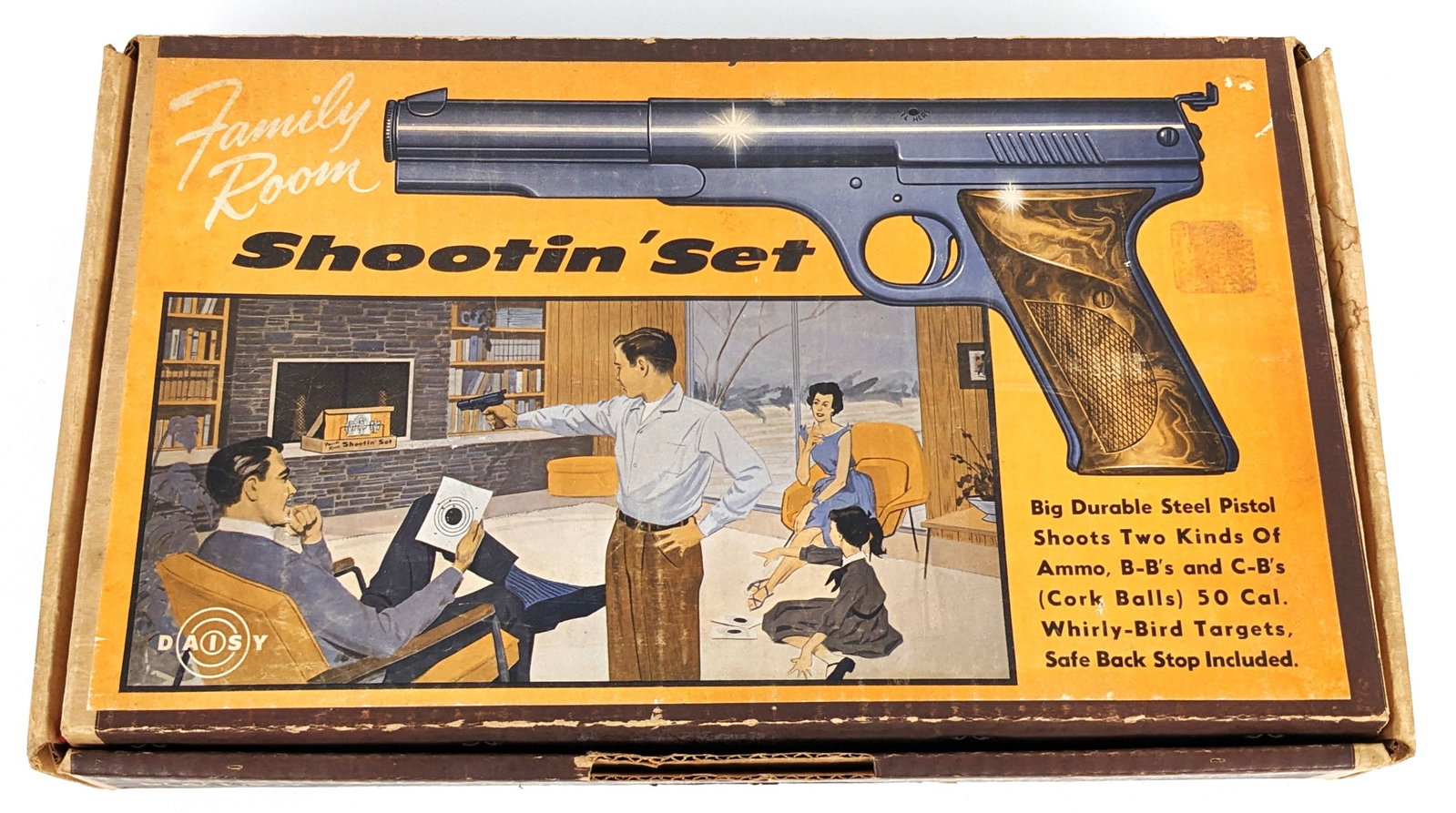 Daisy Family Room Shootin' Set Gun New In Box: Daisy Family Room Shootin' Set in the original box. The set includes a steel pistol that shoots BB's or cork balls. The gun is new old stock in the box. It comes with manual, whirly-bird targets, and 