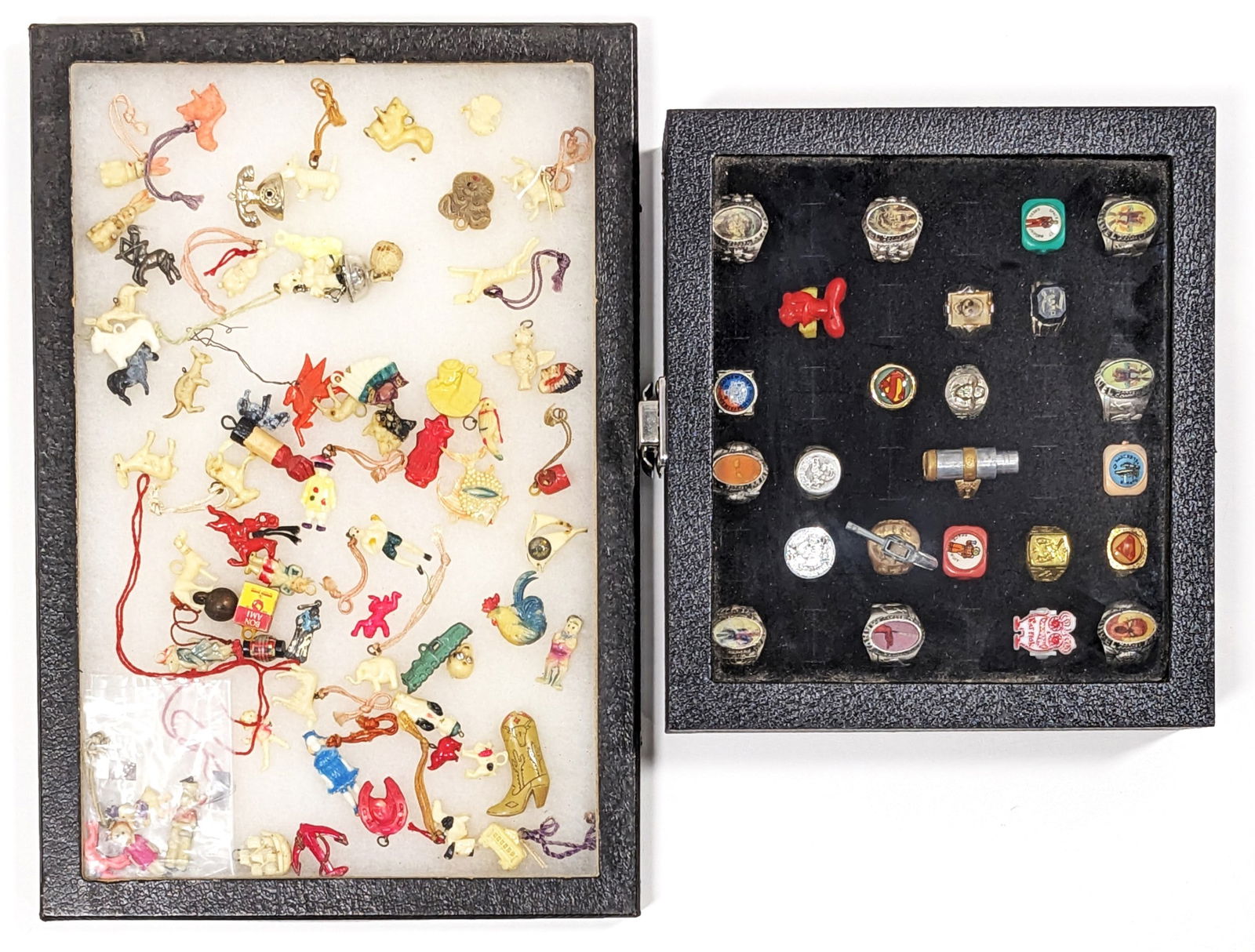 Vintage Cracker Jack Prizes and Toy Rings: Vintage Cracker Jack toy prizes and toy rings. Includes 50+ Cracker Jack prizes and 24 toy rings. The rings include Marvel, Rat Fink, Zorro, Superman, and more.