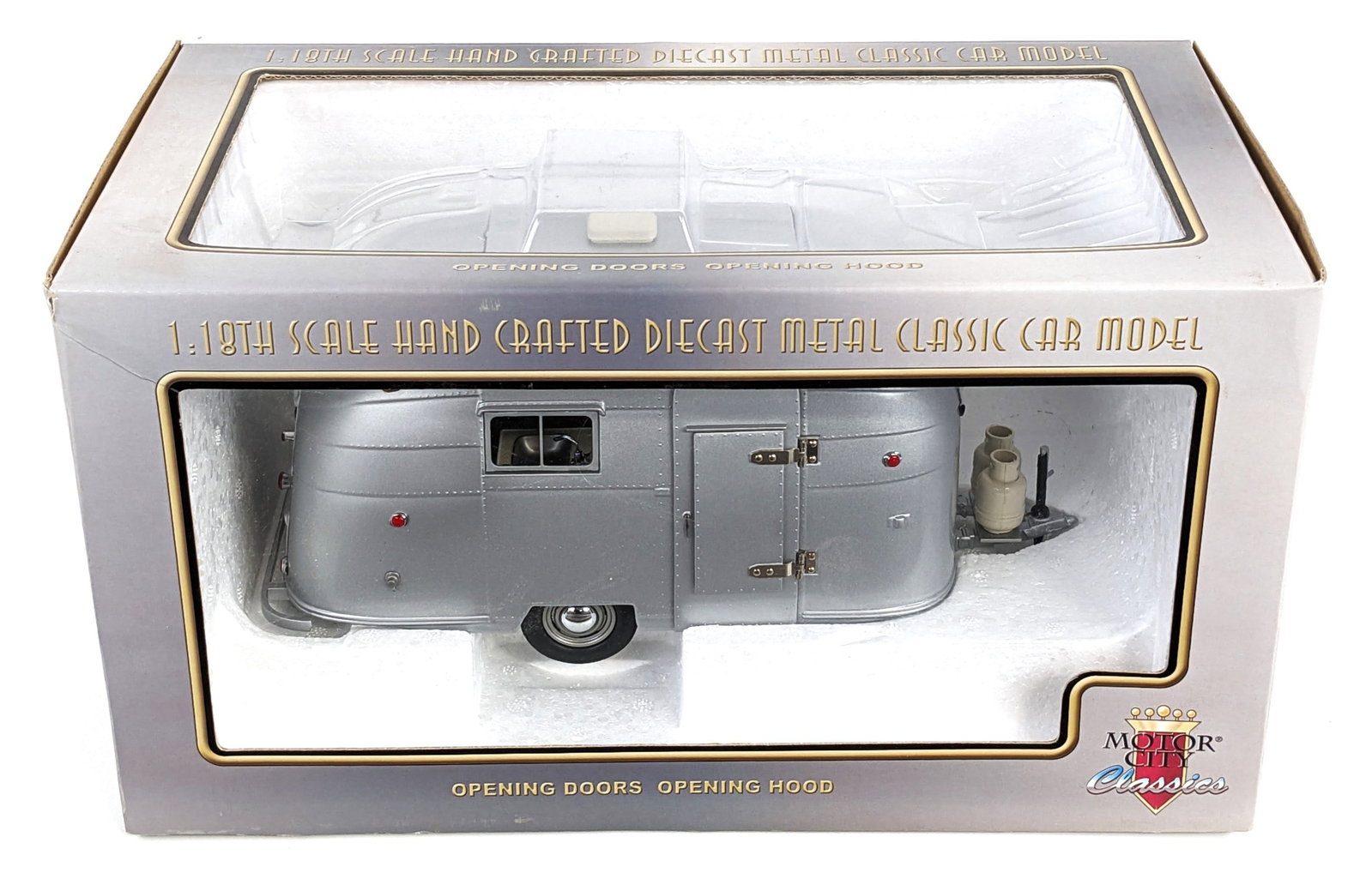 1/18 Motor City Classics Airstream Camper Trailer: 1/18 Scale die-cast Motor City Classics Airstream camper trailer. The trailer is in good condition new in the box. A nice highly detailed replica.