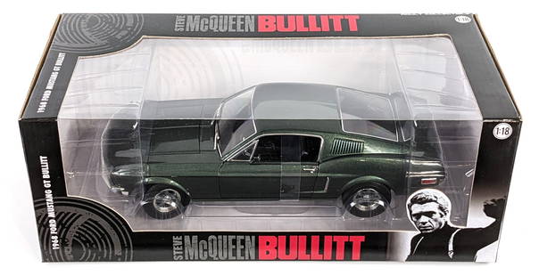 1/18 Scale Greenlight Steve McQueen 1968 Ford Mustang GT Bullitt: 1/18 Scale die-cast Steve McQueen 1968 Ford Mustang GT Bullitt car. The car is new in the box and in excellent condition. The box comes with the protector sleeve.