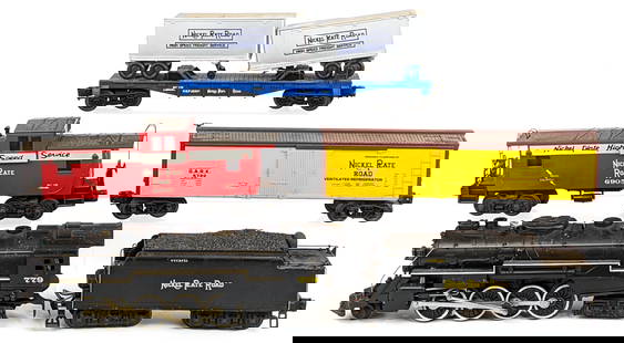 Lionel Nickel Plate Road #779 Loco & Tender Train Set: Lionel O Gauge Nickel Plate Road #779 2-8-4 locomotive and tender train set. Set also includes a flat car with semi trailer load, #6905 caboose, and #5722 ventilated refrigerator car. The set could be