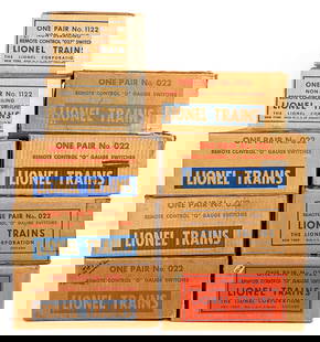 Lionel O Gauge Switches: Lot of Lionel O Gauge switches. Includes (5) pairs of remote control switches, (1) left hand switch, (2) empty boxes of one pair No. 1122 switches, and (1) empty box of one pair No. 022 switches. Swit