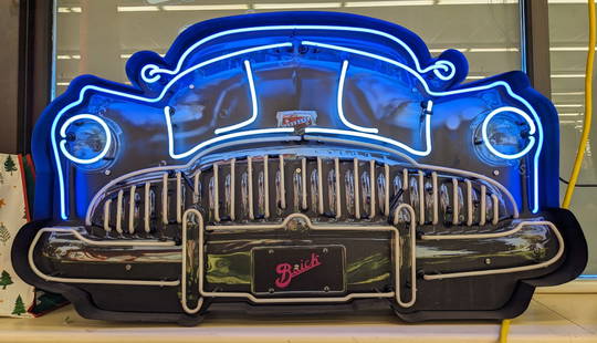 Custom Buick Roadmaster Grill Neon Sign: Appears to be in overall good condition with some wear form display and storage. Does have a loose wire and the bottom portion is not currently lighting up. It measures approximately 53in across by 29