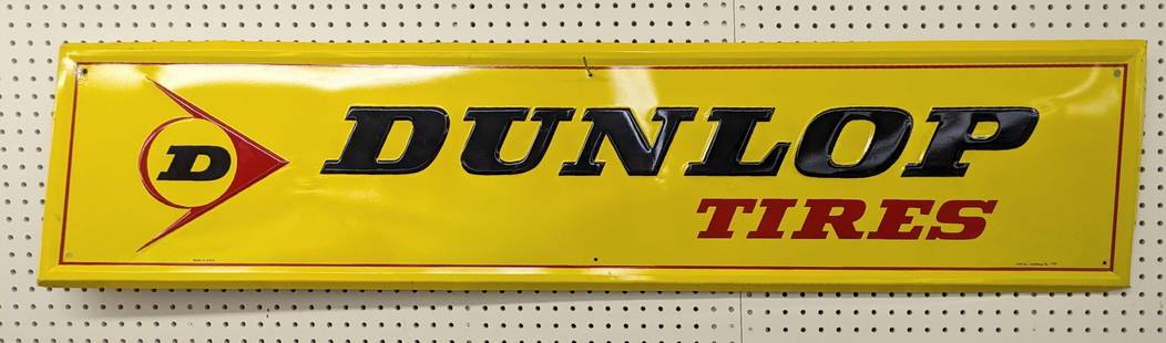 5ft Vintage SST Dunlop Tires Embossed Adv Sign: Vintage single sided embossed metal Dunlop Tires advertising sign. Appears to be in nice condition with some scratches and wear from display and age. Measures approximately 5ft across by 14in tall.