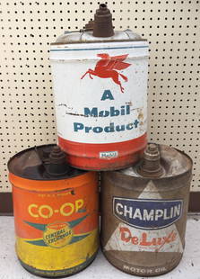 (3) Vintage 5 Gallon Motor Oil / Gasoline Cans: Lot of three vintage 5 gallon oil cans. Lot includes a Mobil, CO-OP, and and Champlin. They vary in condition with paint loss, rust, and wear from use and age. Display well.