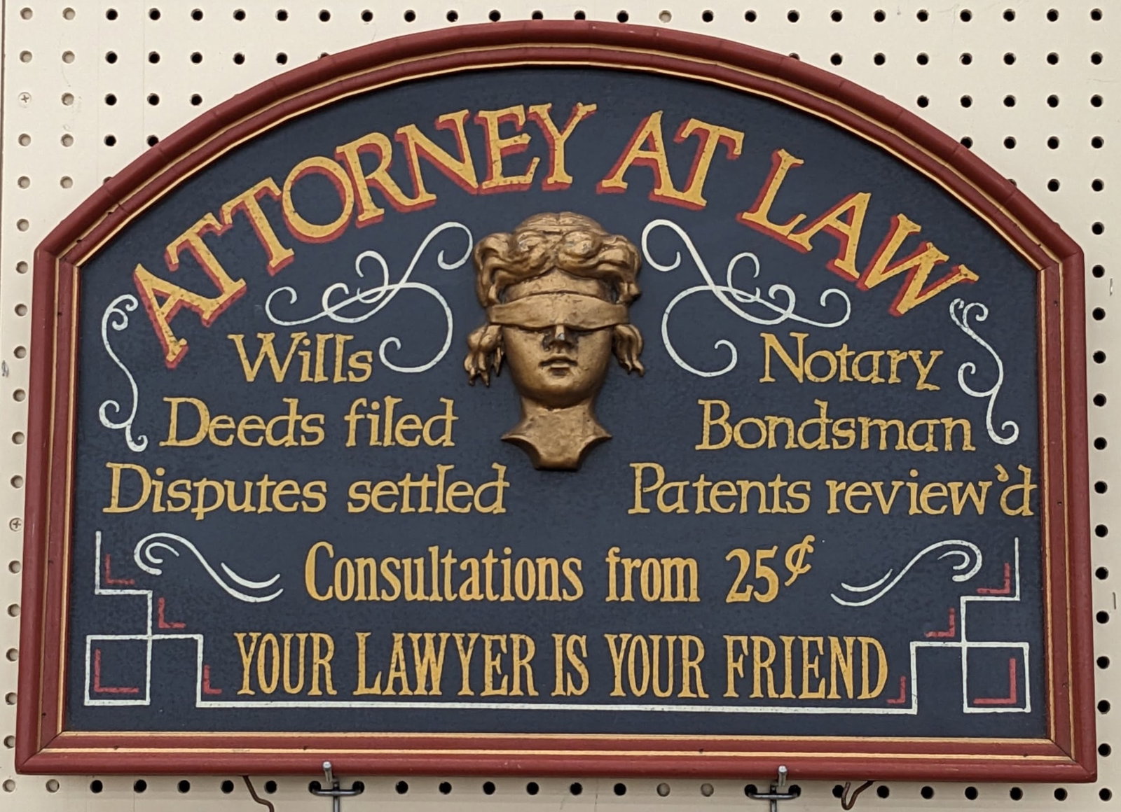 SSW Attorney At Law Fantasy Advertising Sign: Unique custom Attorney At Law fantasy wood advertising sign. Appears to be in good condition with some paint loss and wear from display. Measures approximately 24in across by 17in tall.