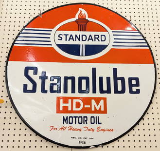 DSP Standard Oil Stanolube Motor Oil Replica Sign: Double sided porcelain Standard Stanolube Motor Oil replica advertising sign. Appears to be in nice condition with light porcelain loss and wear. Measures approximately 30in in diameter.