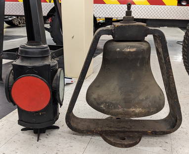 Vintage Railroad Locomotive Bell & Lantern: Vintage railroad locomotive bell and lantern. Both have been repainted .The lantern has fake lens inserts. Both have paint loss and wear. Bell measures approximately 20in tall by 18in across.