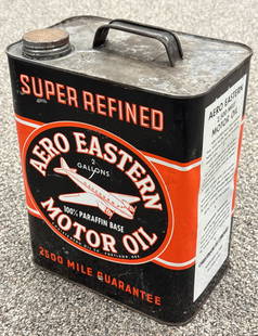 2 Gallon Aero Eastern Motor Oil Can: Can has a very nice airplane graphic on both sides. The can has scattered dents, scrates, and some rusting from age.