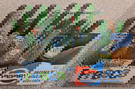 Various Brand Soda Bottles & Cardboard Carriers: Bottles are all in dirty aged condition with wear to the carriers from age.