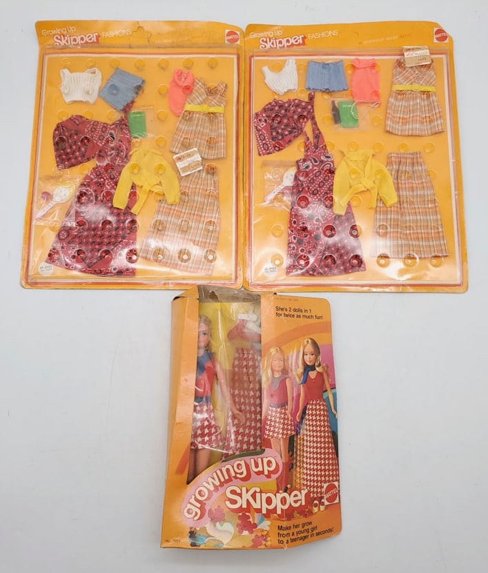 Mattel Growing Up Skipper No. 7259 with Outfits #9659: In original packageing. The Skipper box is extremely worn with a hole in the plastic. The clothing packages have dings and folds on the corners.