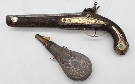 1885 Flintlock Pistol Ornately Carved with Brass Accents and Powder Horn