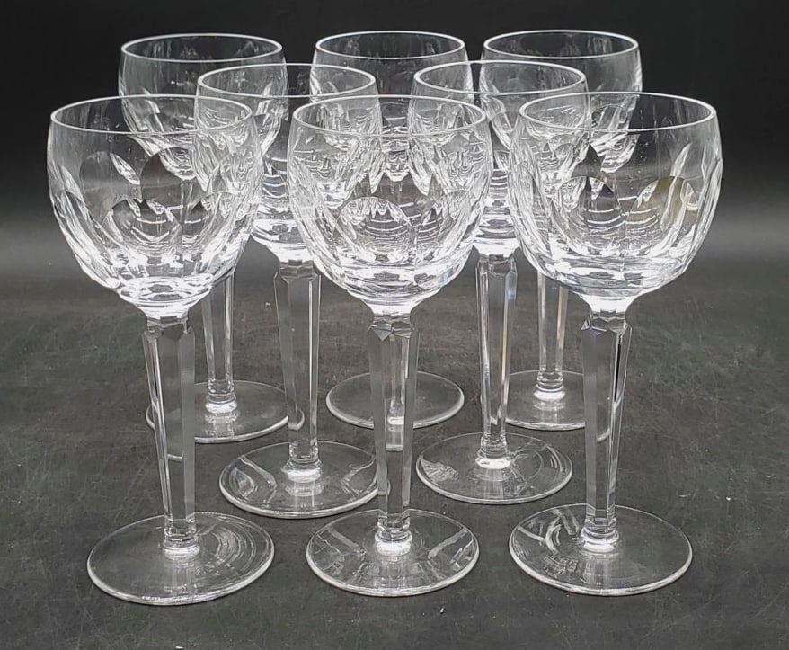 (8) Waterford Crystal Sheila Hock Wine Glasses: The glasses are in very good condition with no chips or cracks. The glasses are 7-3/8" tall. They are etched Waterford on the bottom.