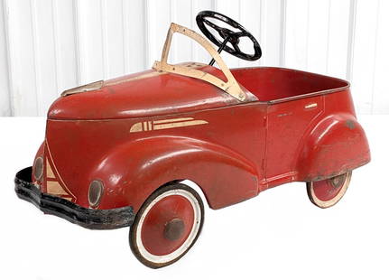 Original 1930's Garton Ford Pedal Car: Original 1930's Garton Ford pedal car. The car is all original with paint loss and wear from use / age. It is missing both rear rubber tires. Displays well with patina. Measures approximately 36"