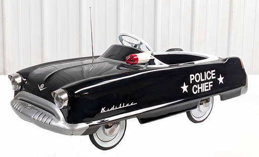 Restored Garton Kidillac Police Chief Pedal Car: Professionally restored Garton Kidillac Police Chief pedal car. The car has the chain drive mechanism. It displays very well with Delta siren light, electric headlights that work, antenna, Police